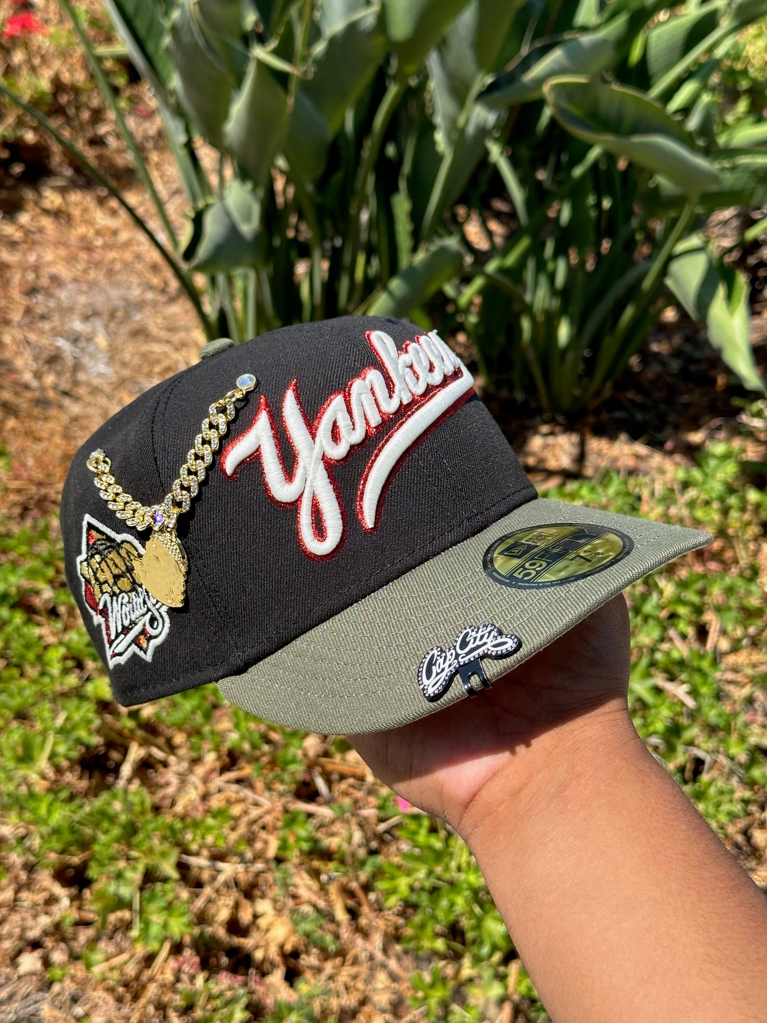 NEW ERA EXCLUSIVE 59FIFTY BLACK/OLIVE NEW YORK YANKEES SCRIPT W/ 1999 WORLD SERIES SIDE PATCH