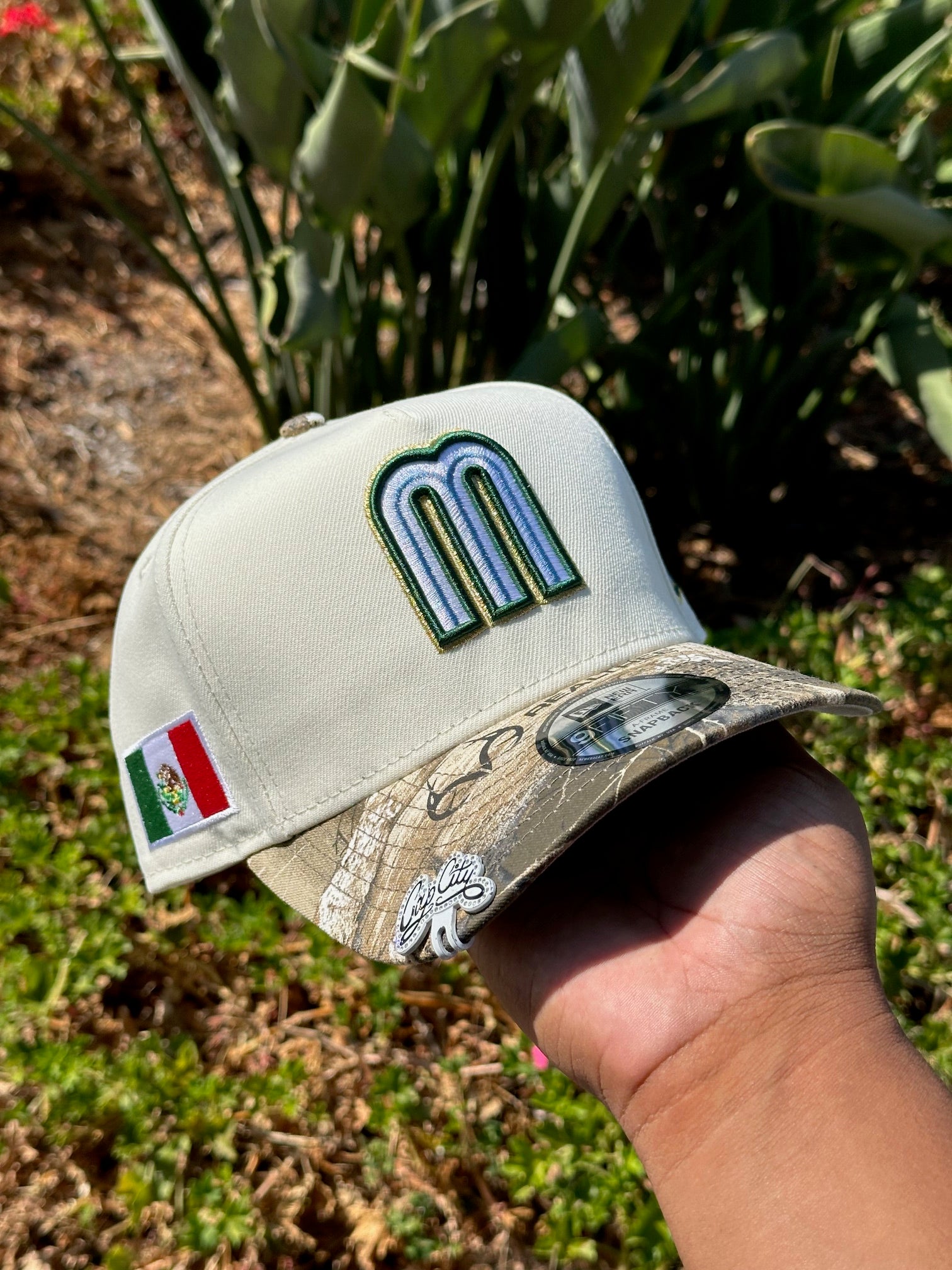 NEW ERA EXCLUSIVE 9FIFTY A-FRAME CHROME WHITE/REALTREE MEXICO W/ MEXICO FLAG SIDE PATCH