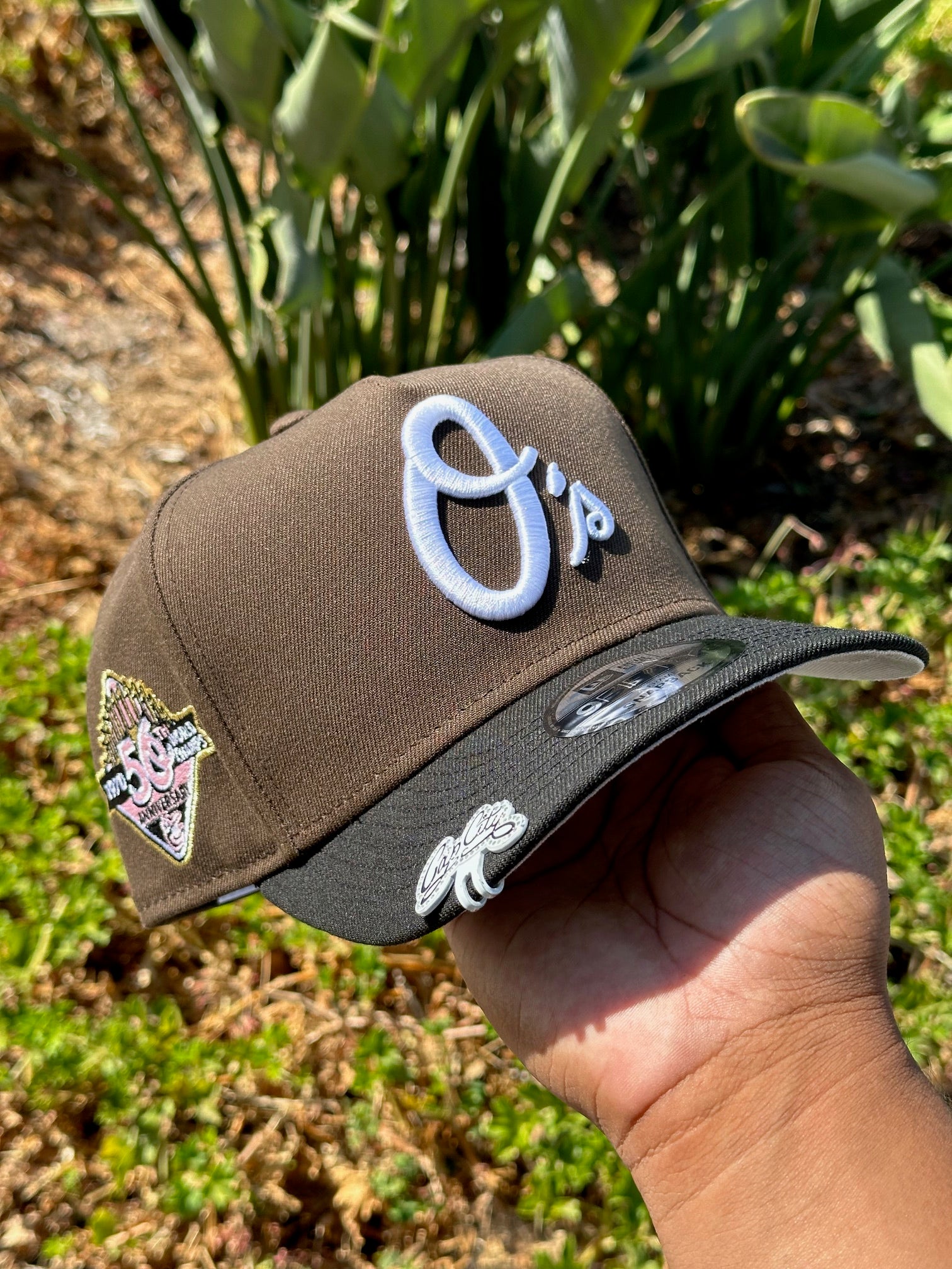 NEW ERA EXCLUSIVE 9FIFTY A-FRAME BROWN/BLACK BALTIMORE ORIOLES W/ 50TH ANNIVERSARY SIDE PATCH