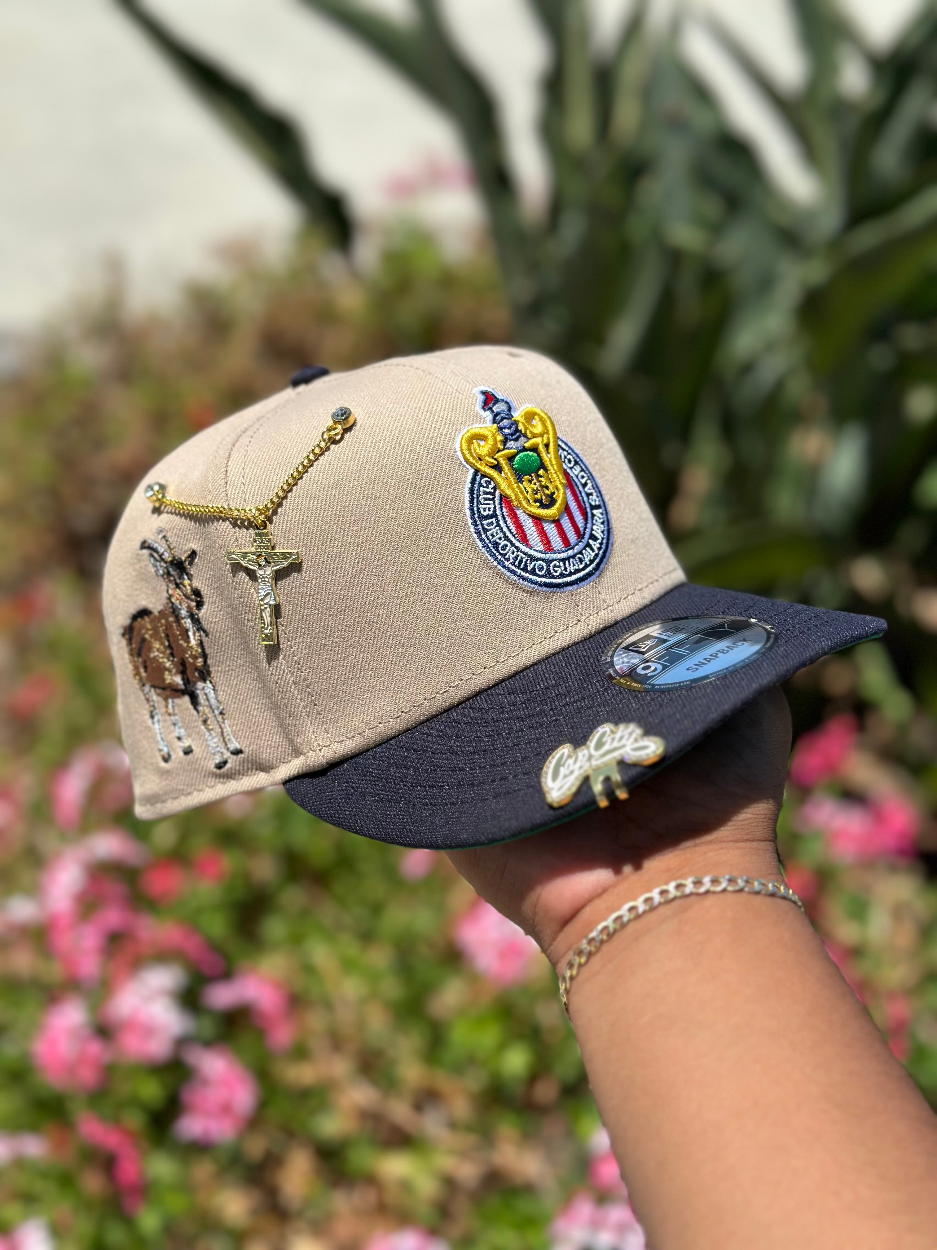 NEW ERA EXCLUSIVE 9FIFTY CAMEL BROWN/NAVY CHIVAS DE GUADALAJARA SNAPBACK W/ "GOAT 2.0" SIDE PATCH